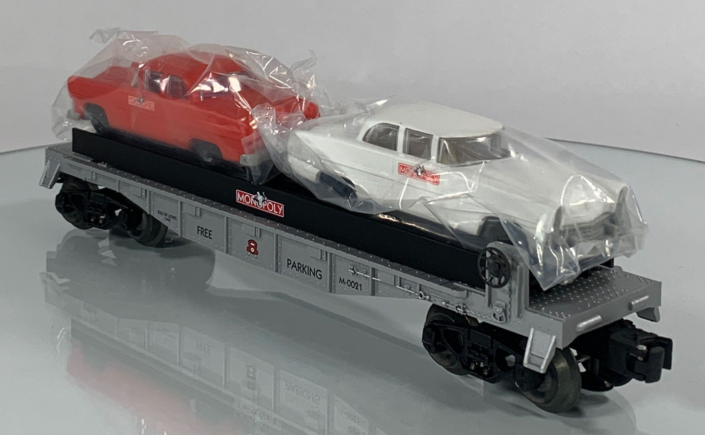 LIONEL • O GAUGE • 1999 Monopoly Free Parking Flatcar w 2 Autos 6-52184 • NEW OLD STOCK